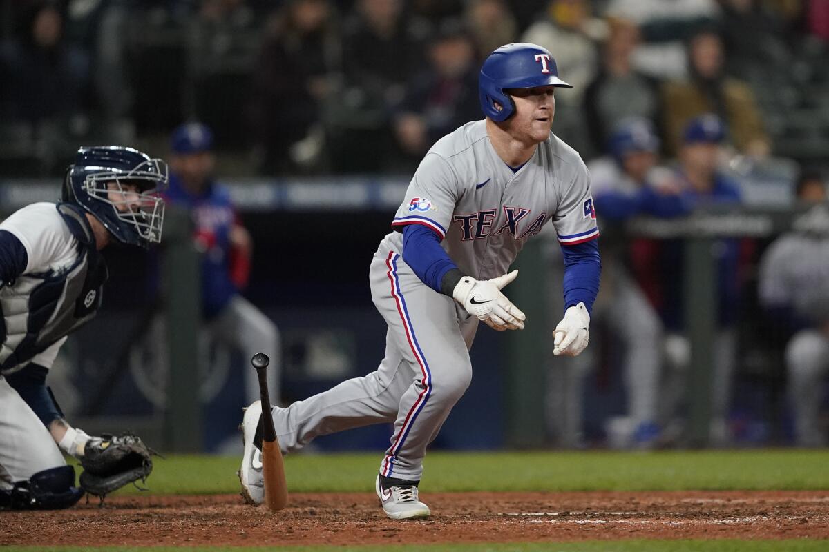 Rangers snap 5-game skid, rally past Mariners for 8-6 win - The